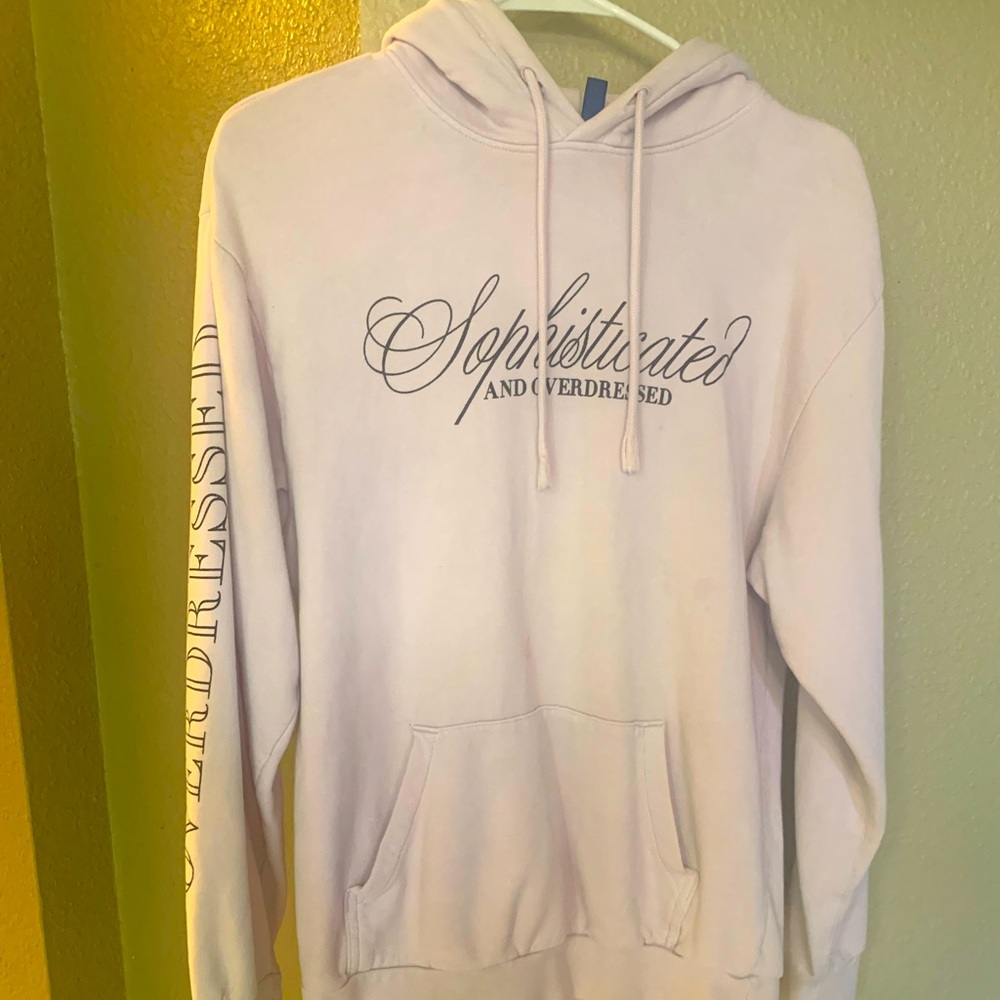 Long sleeve hoodie. Very light purple color.